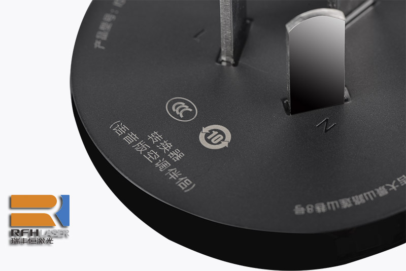 Compact high repetition rate nanosecond lasers marking on blace plastic
