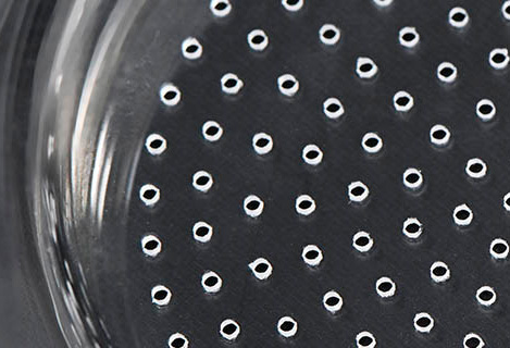 Solid-state 355 nm ultraviolet laser drilling glass