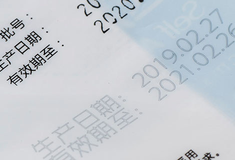 Ultraviolet laser marking date on plastic food package